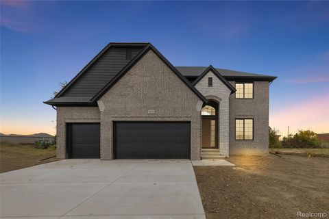 Photo of 56703 Cortona Drive, Macomb Township, MI 48042 (MLS # 20251060538)