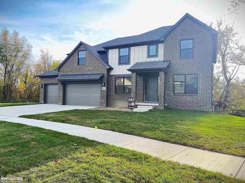 Photo of 45155 Twin River Drive, Macomb Township, MI 48044 (MLS # 58050186452)