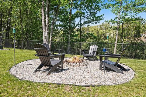 Tiny photo for 1735 Iroquois Trail, Grant Township, MI 48748 (MLS # 77080068998)
