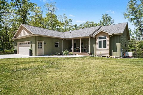 Tiny photo for 1735 Iroquois Trail, Grant Township, MI 48748 (MLS # 77080068998)