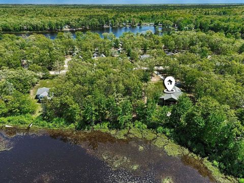 Tiny photo for 1735 Iroquois Trail, Grant Township, MI 48748 (MLS # 77080068998)