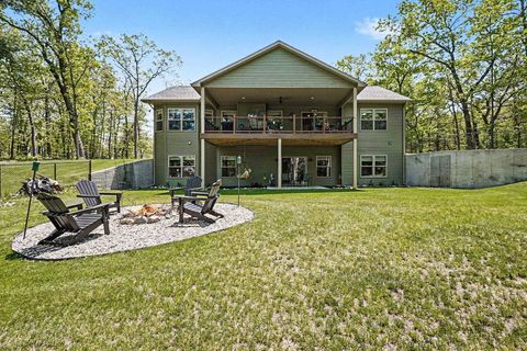 Tiny photo for 1735 Iroquois Trail, Grant Township, MI 48748 (MLS # 77080068998)