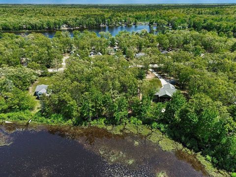 Tiny photo for 1735 Iroquois Trail, Grant Township, MI 48748 (MLS # 77080068998)