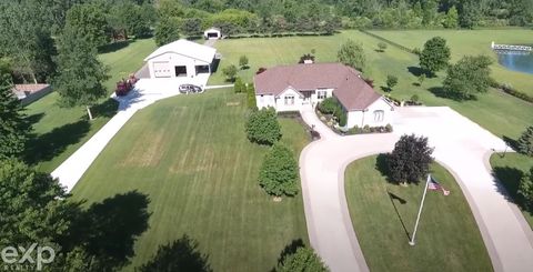 Photo of 53203 Foss Road, Macomb Township, MI 48042 (MLS # 58050207882)