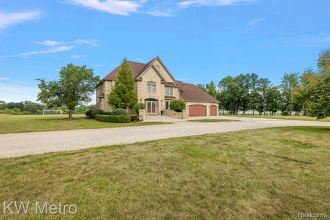 Photo of 54720 Foss Road, Macomb Township, MI 48042 (MLS # 20261045268)