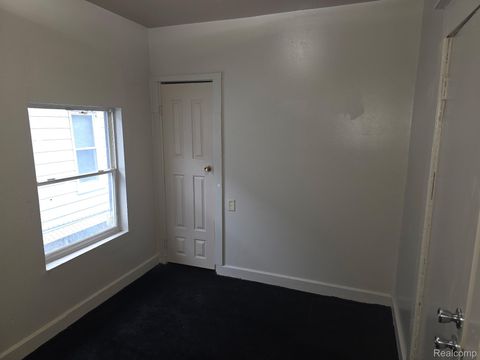 1117 E Oakland Avenue Lansing City MI 48906