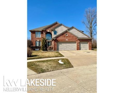 Photo of 50441 Aldwych Street, Macomb Township, MI 48044 (MLS # 58050200951)