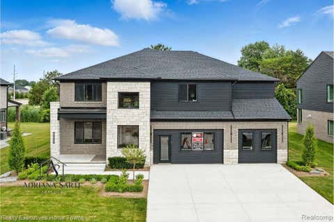 Photo of 50964 MISTWOOD Drive, Macomb Township, MI 48042 (MLS # 20250009613)