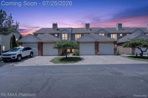 Photo of 5510 Woodruff Shore Drive #25, Brighton Township, MI 48116 (MLS # 20261057563)