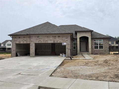 Photo of 50539 Mistwood Drive, Macomb Township, MI 48042 (MLS # 20261060203)
