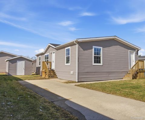 Photo of 1935 Juneau Court, Hartland Township, MI 48353 (MLS # 20261014312)