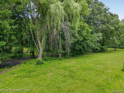 Tiny photo for 425 Courtney Road, Addison Township, MI 48367 (MLS # 20261047824)