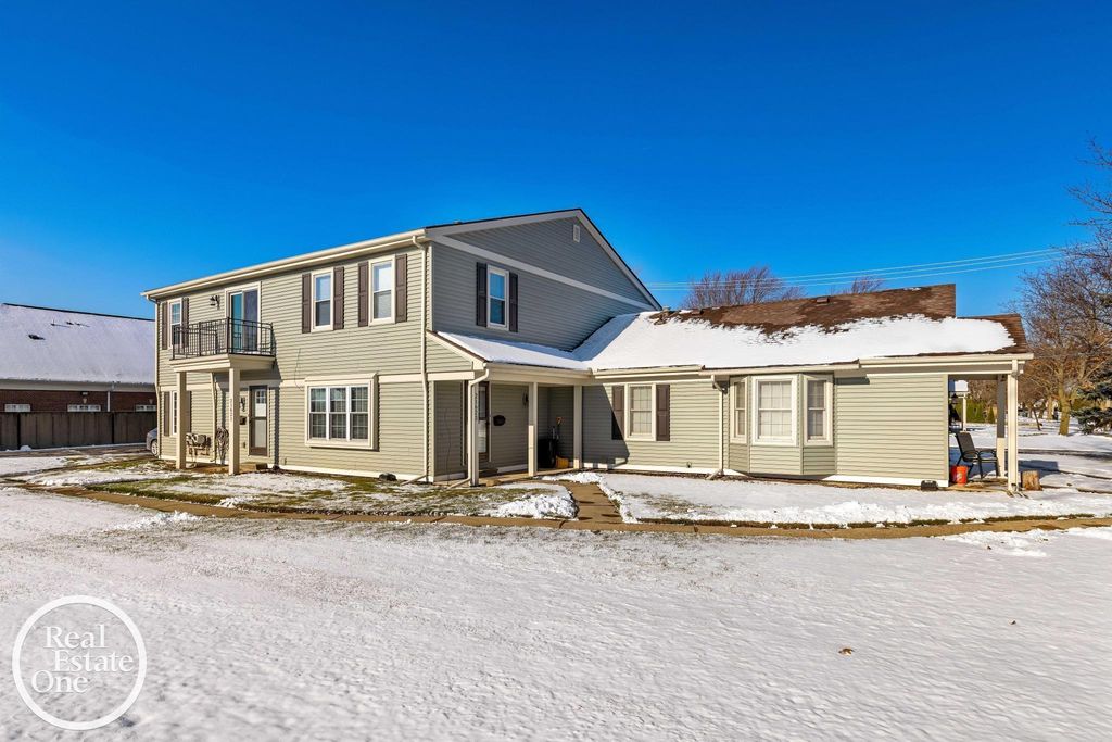 Photo of 21621 E 11 Mile Road, St Clair Shores City, MI 48081 (MLS # 58050200718)