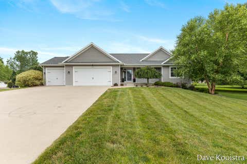 Photo of 1012 W Main Street, Middleville Village, MI 49333 (MLS # 65026035201)