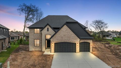 Photo of 50318 Mistwood Drive, Macomb Township, MI 48042 (MLS # 20261030122)