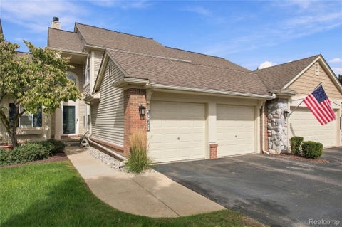 Photo of 46497 Killarney Circle #173, Canton Charter Township, MI 48188 (MLS # 20261077307)