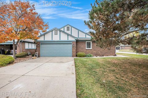 Photo of 15511 Huntcliff Drive, Macomb Township, MI 48044 (MLS # 20251046588)