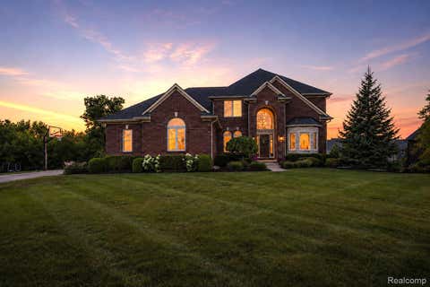 Photo of 24447 Ravine Dr, Lyon Charter Township, MI 48178 (MLS # 20261058592)