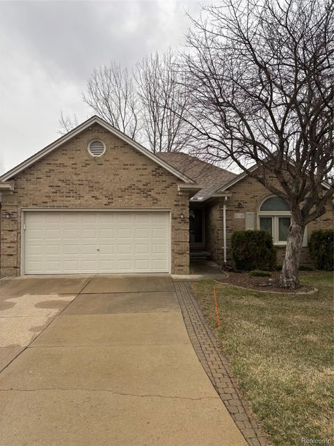 Photo of 21767 Sunset Drive #25, Macomb Township, MI 48044 (MLS # 20261015467)