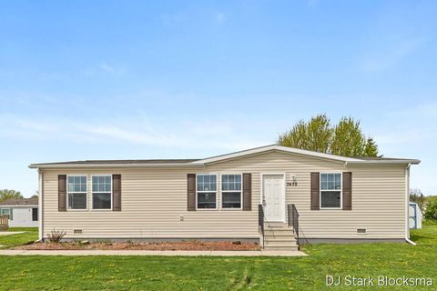 Photo of 7435 Bronco Drive SE, Caledonia Township, MI 49316 (MLS # 65026019212)