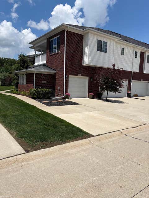 Photo of 6989 Boulder Pointe Drive, Washington Township, MI 48094 (MLS # 58050216408)