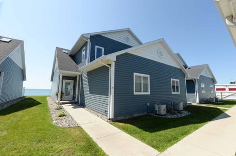 Photo of 708 E Bay Street, Baldwin Township, MI 48730 (MLS # 77080071694)