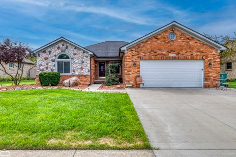 Photo of 47788 Meadowbrook Drive, Macomb Township, MI 48044 (MLS # 58050221458)