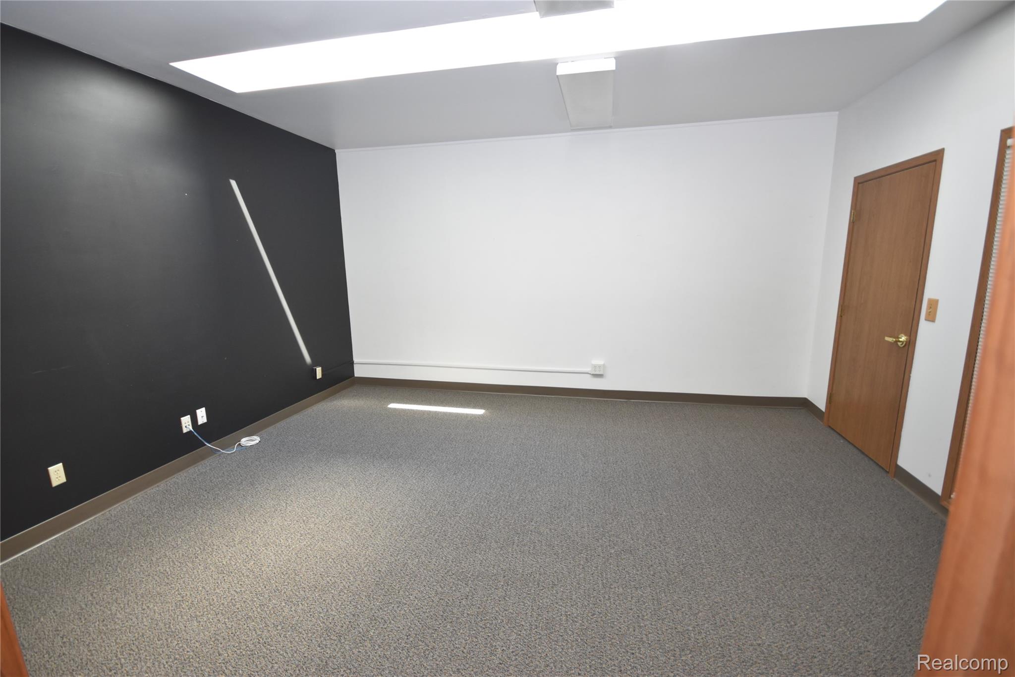 8469 S Saginaw Street Ste. Skylight
