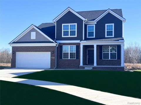 Photo of 51410 Green Meadows Drive, Macomb Township, MI 48042 (MLS # 20251053965)