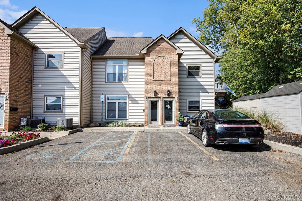 Photo of 40 Park Island Drive #4, Lake Orion Village, MI 48362 (MLS # 20261071495)