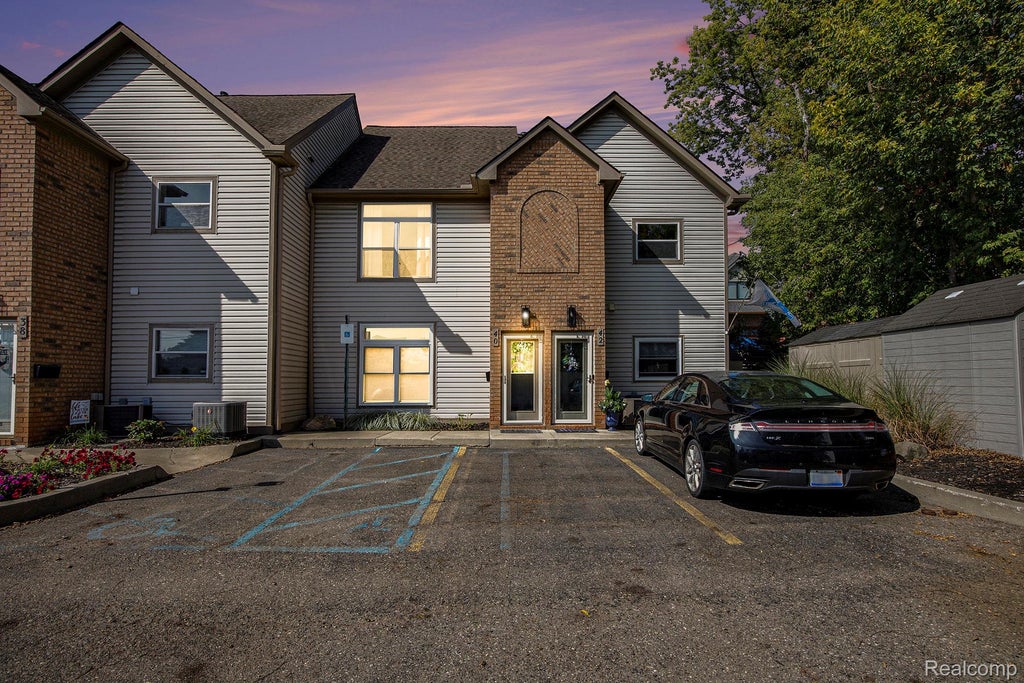 Photo of 40 Park Island Drive #4, Lake Orion Village, MI 48362 (MLS # 20261071495)