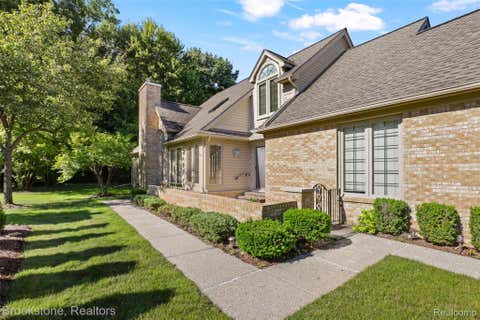 Photo of 16981 Sandstone Circle #74, Macomb Township, MI 48042 (MLS # 20261044812)