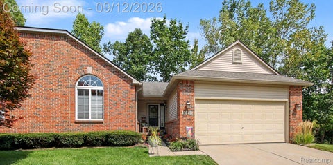 Photo of 10457 Woodcliff Court #51, Hartland Township, MI 48353 (MLS # 20261072694)