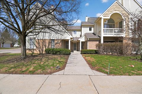 Photo of 208 Oakbrooke Drive #4, South Lyon City, MI 48178 (MLS # 20261022040)