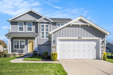 Photo of 8544 Jacaranda Drive, Windsor Charter Township, MI 48821 (MLS # 20251045579)