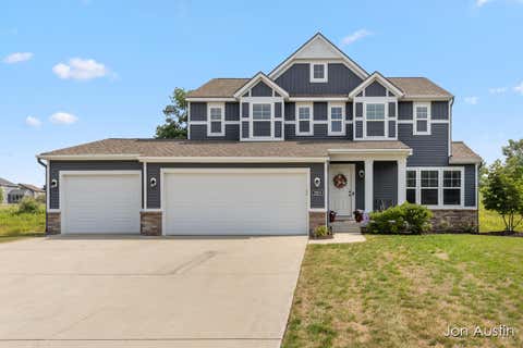 Photo of 2929 E Morgan Trail NE, Algoma Township, MI 49341 (MLS # 65026037366)