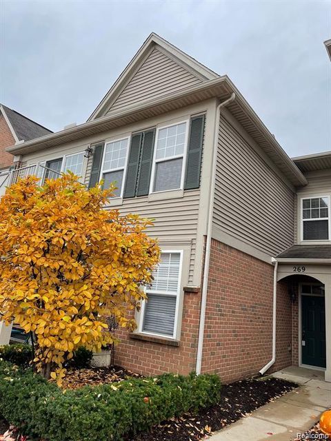 Photo of 269 Wright Street #67, Wixom City, MI 48393 (MLS # 20261021731)