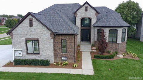 Photo of 6489 POND Dr, Washington Township, MI 48094 (MLS # 20261043786)