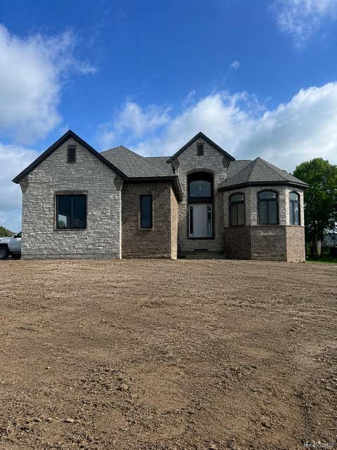 Photo of 6489 POND Dr, Washington Township, MI 48094 (MLS # 20261043786)
