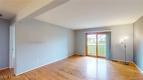 Photo of 15769 Balfour Drive #22, Macomb Township, MI 48044 (MLS # 20261027990)
