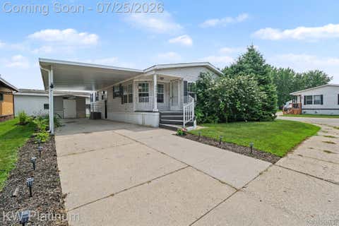 Photo of 49454 Wisteria Court, Shelby Charter Township, MI 48315 (MLS # 20261056594)