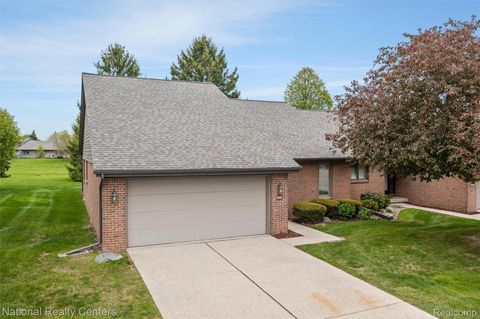 Photo of 16061 Meadows Drive, Macomb Township, MI 48044 (MLS # 20261032418)