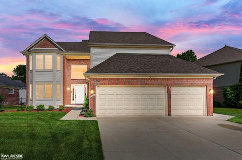Photo of 51389 Midland Circle, Macomb Township, MI 48042 (MLS # 58050209247)