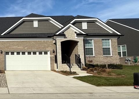 Photo of 55733 Oak Pointe Drive, Shelby Charter Township, MI 48315 (MLS # 20251060056)