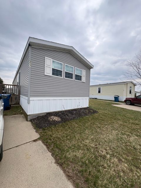 Tiny photo for 360 E Tuttle Road #217, Ionia Township, MI 48846 (MLS # 65026013606)