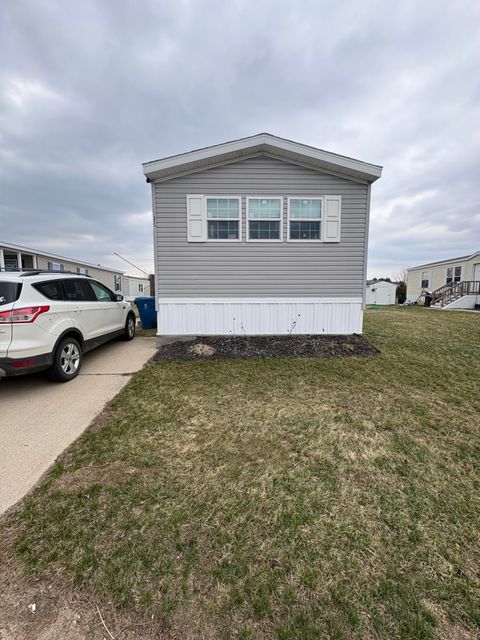 Photo of 360 E Tuttle Road #217, Ionia Township, MI 48846 (MLS # 65026013606)