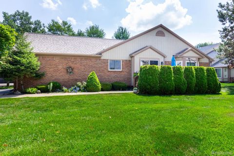 Photo of 46910 Country Lane #12, Macomb Township, MI 48044 (MLS # 20261053758)