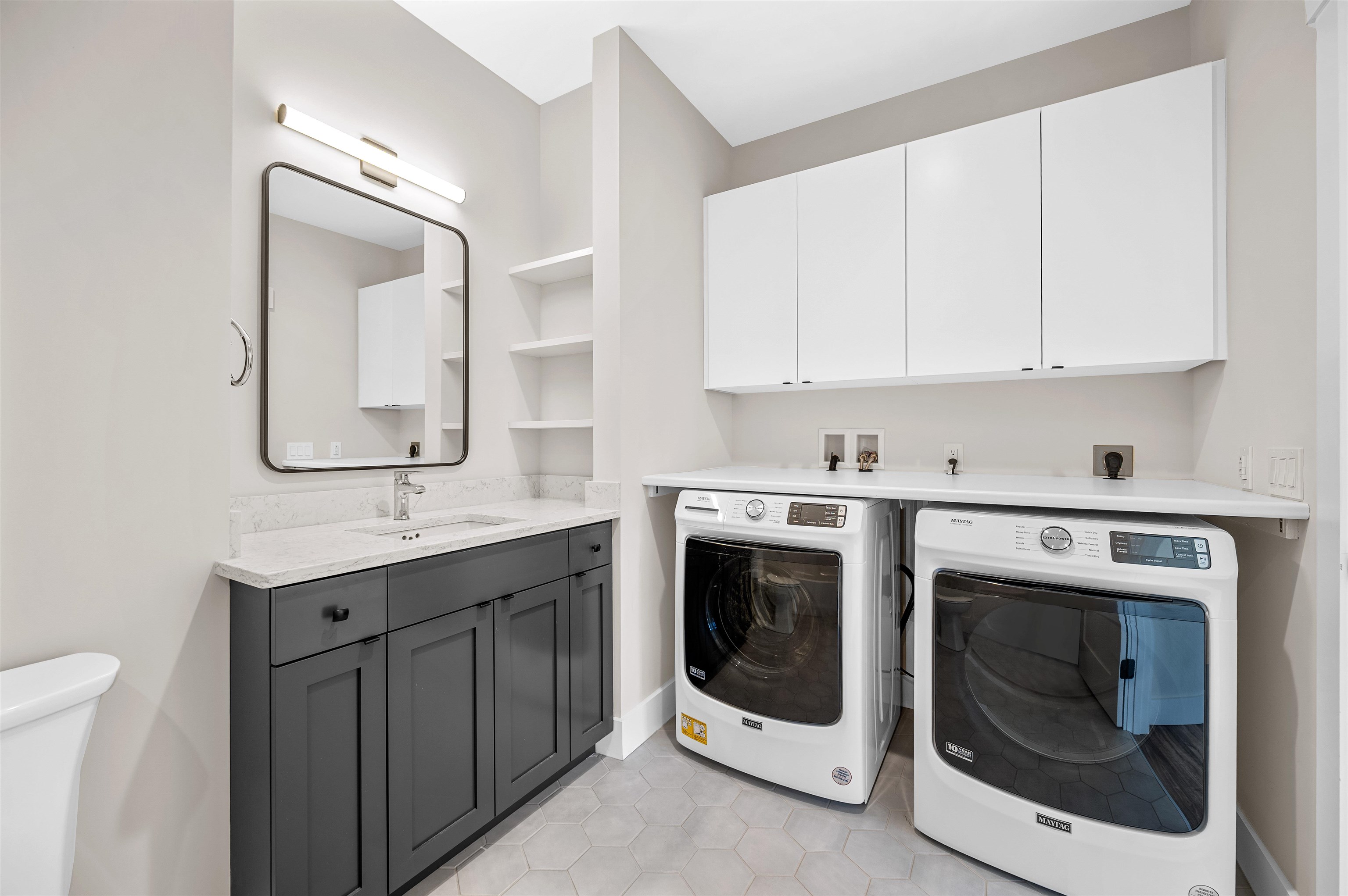 Welcome to one-level luxury living at its finest. This stunning top-fl – image 32
