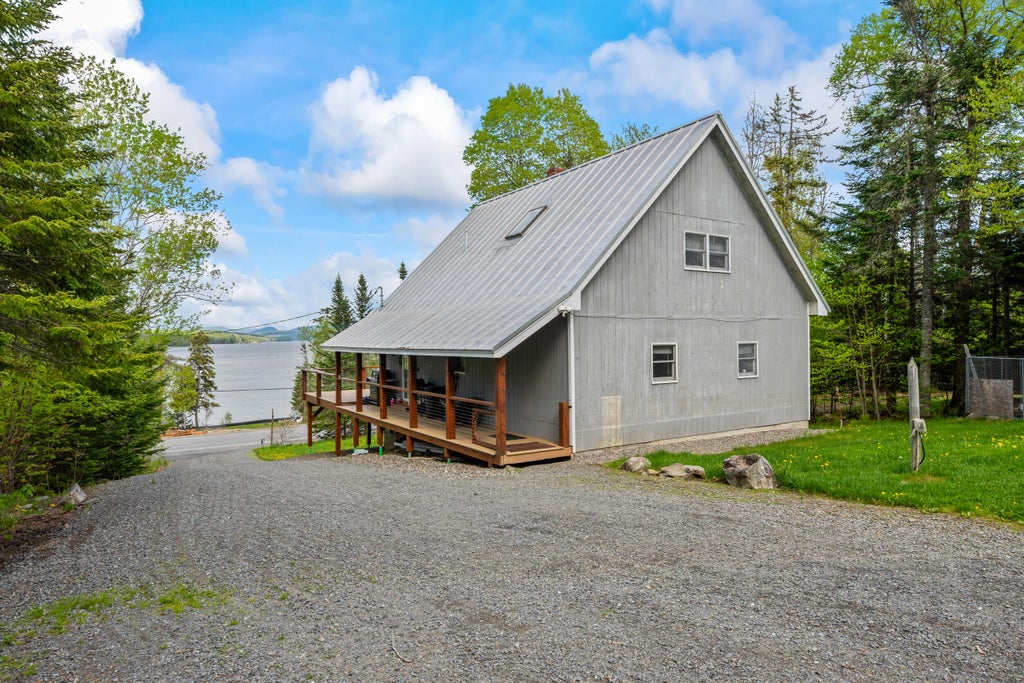 Photo of 303 Rumford Road, Rangeley, ME 04970 (MLS # 1657550)