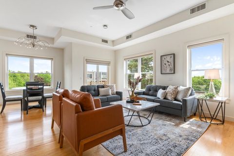 Photo of 135 Sheridan Street #404, Portland, ME 04101 (MLS # 1666771)